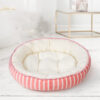 Cama redonda acolchoada rosa às riscas para cão ou gato