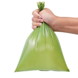 Saco verde para recolha de dejetos de cão