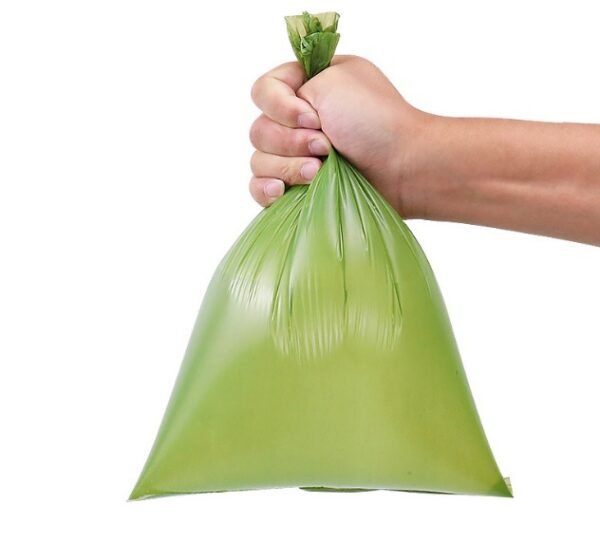 Saco verde para recolha de dejetos de cão