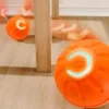 Sb8a6d053b6cc4f2793229bbcc8b06c01P.webp Bola interativa laranja em movimento no chão de casa